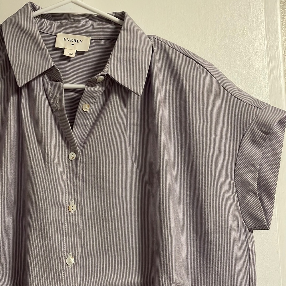 Purple and white striped blouse